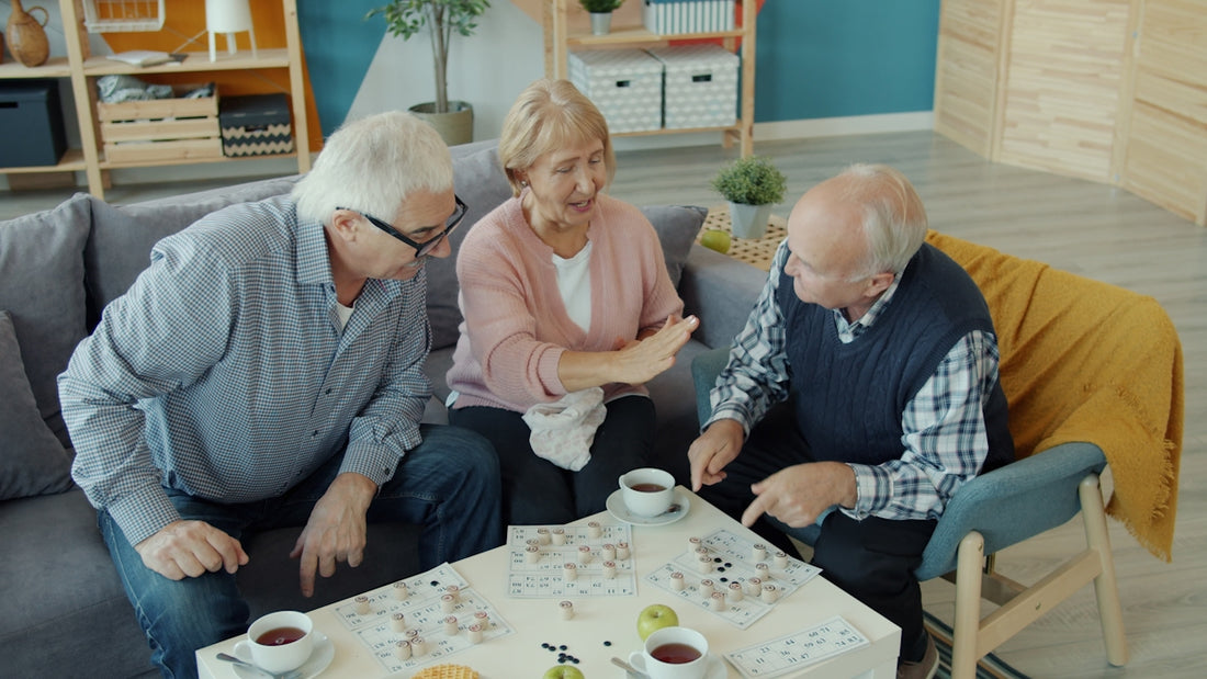 Seniors enjoying coffee and a puzzle together